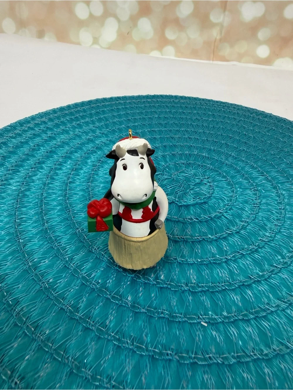 Hallmark White and Black Cow Ornament with Red and Green Gift